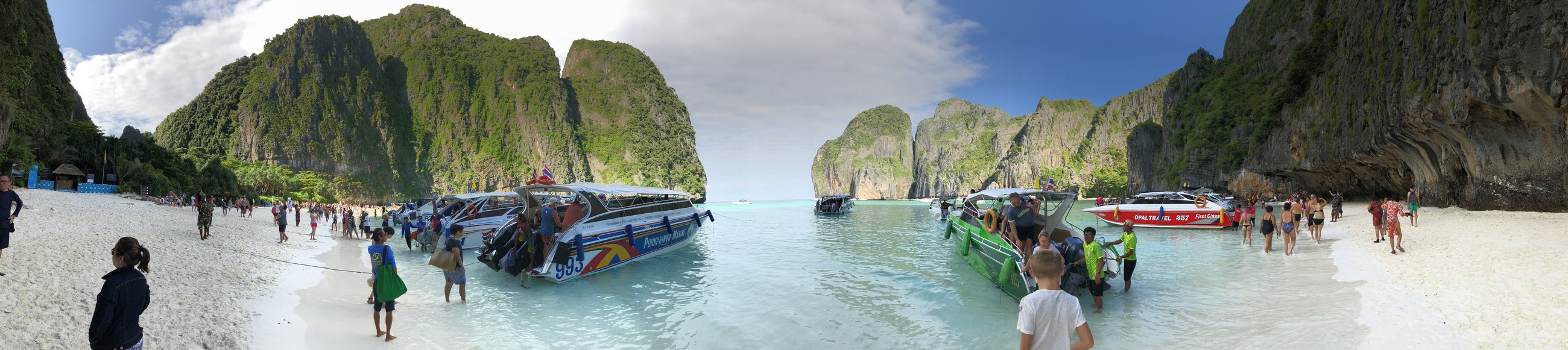 Phi Phi Islands — long-tail boats and limestone cliffs