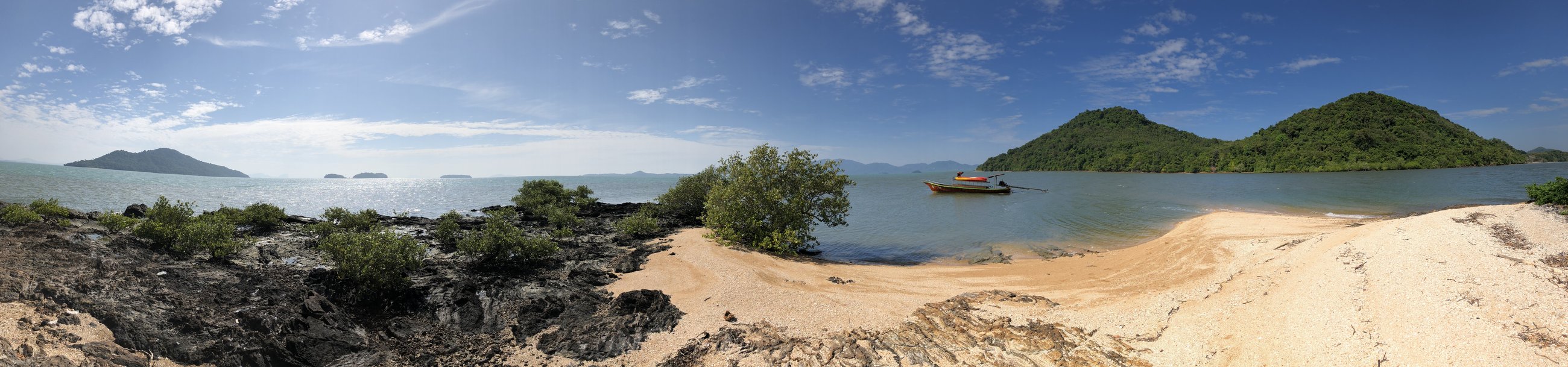 Andaman islands — A panoramic island lookout: sand, sea and green hills all the way across.