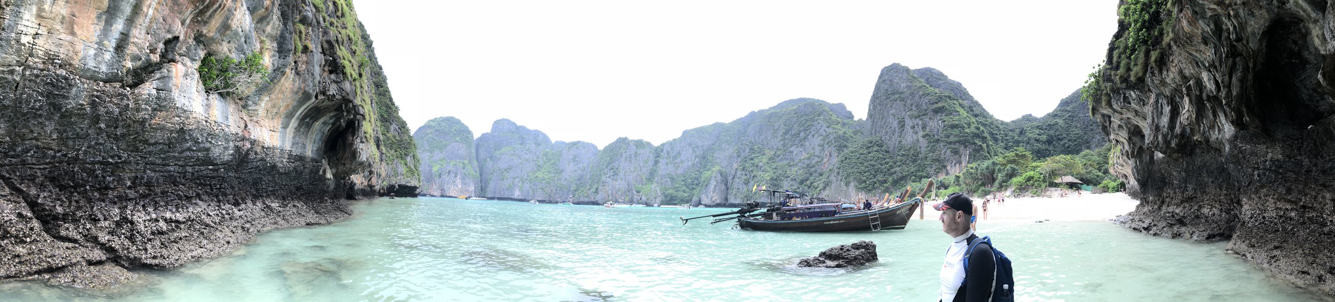 Phi Phi Islands — The lagoon opens up in a cinematic panorama from the boat.